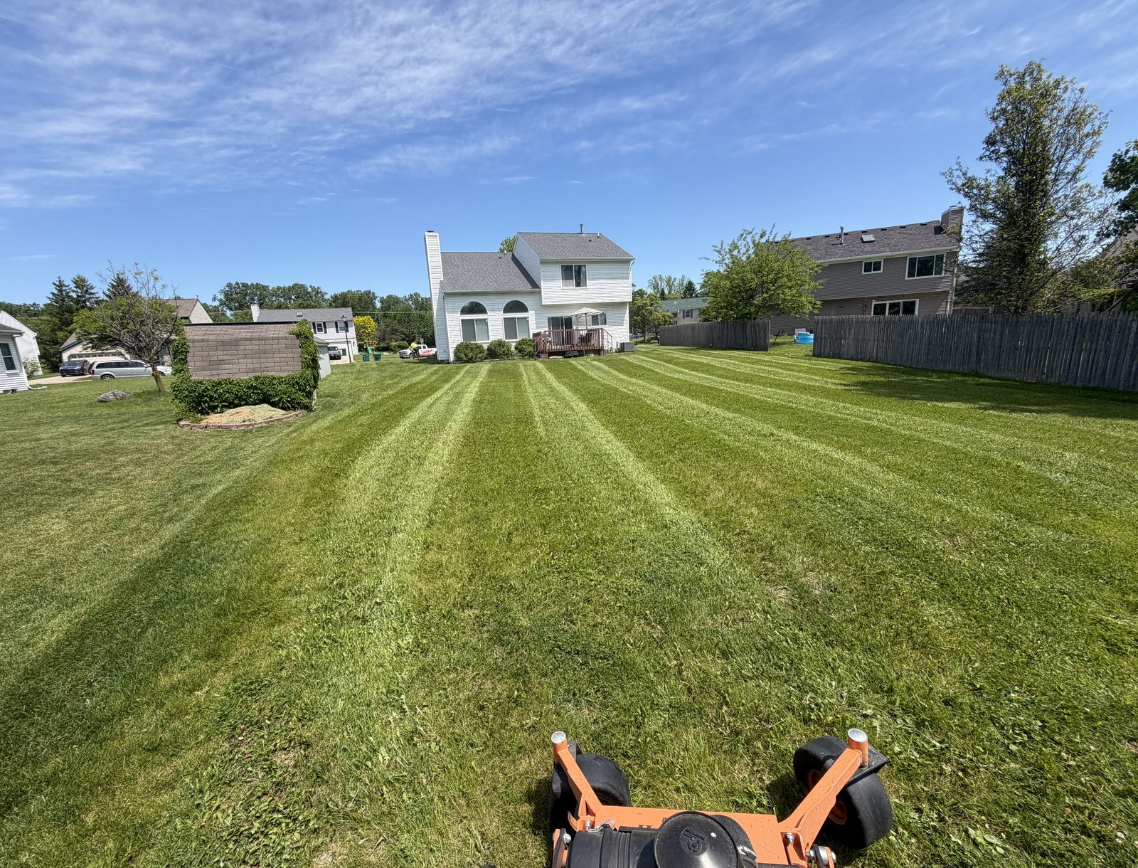 Freshly striped green lawn on an Ann Arbor-area property